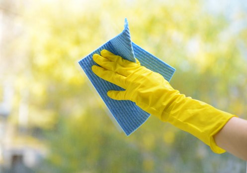 Local cleaning team completing a move out clean in a Sutton apartment block